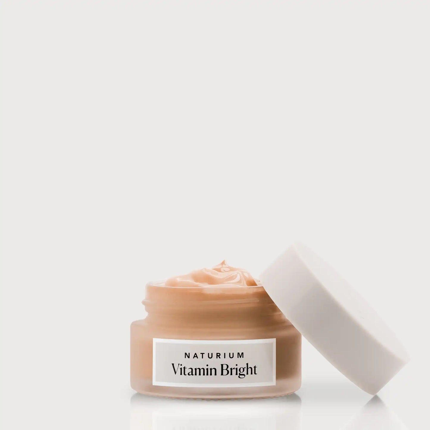 vitamin-bright-illuminating-eye-cream-f2 NATR-VitaminBright_DEEP_Primary_front_openjar_bone.webp